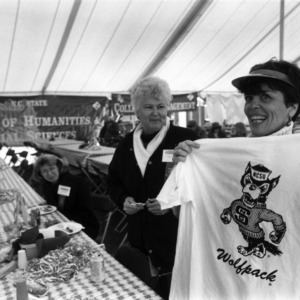 Two women at a CALS alumni tailgate event, 1990s