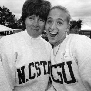 Two women at the NC State Alumni Association tailgate event, 1997