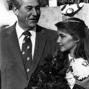 Chancellor Poulton and Miss NCSU Melody Speck, Homecoming game, 1984