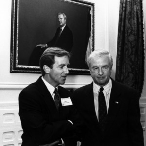 Governor Hunt chats with guests at a NC State Alumni-Alumnae event, 1990s