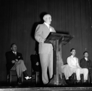 Dean J. H. Lampe speaking at graduation exercises