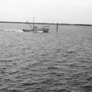 Yacht in Bogue Sound in front of Morehead City Technical Institute