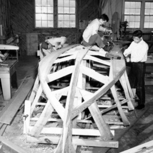 Students building a boat