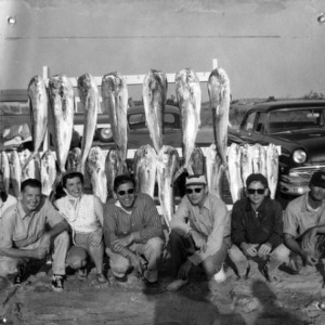 Group with fish they caught on trip