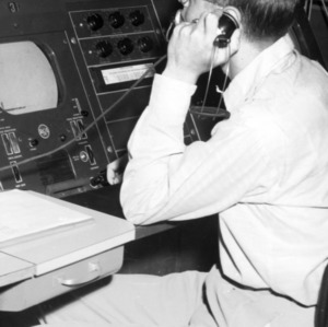 Engineer at the master controls for TV station WNCT