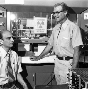 Two men in Civil Engineering lab with radioactive materials