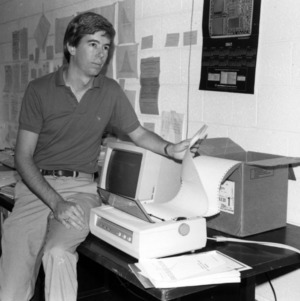 Dr. Tom Miller with computer