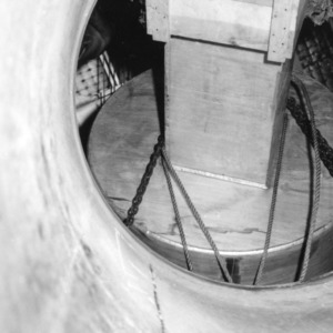 View of tank as it is lowered into reactor shield
