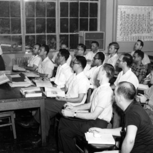Dr. William Barclay instructing Nuclear Technology Short Course class for Atoms For Peace Program
