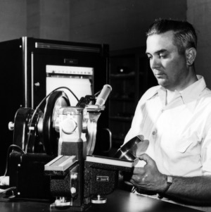 Dr. Arthur C. Menius with X-ray diffraction equipment