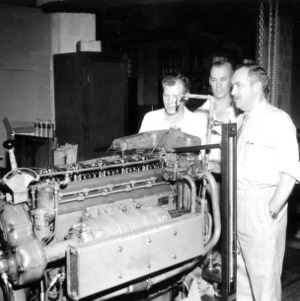 Researchers with diesel project engine