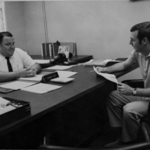 Raymon E. Tew and other in office