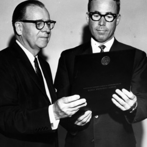 Ralph E. Fadum and other with award