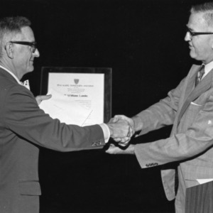 William Lambe receiving award