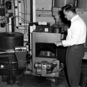 Thurman Upchurch with research equipment in laboratory