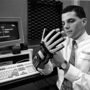 College of Engineering publicity and promotional material, student with power glove