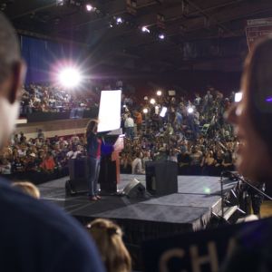 People cheering for Barack Obama at rally