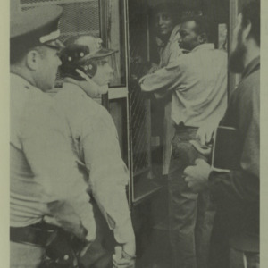 Raleigh police arresting students during Black student's march to Chancellor's home (Technician April 16, 1969)