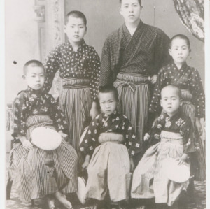 Yoshio Nishina, age eleven, with his brothers and cousins
