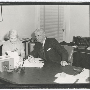 Man and woman at desk