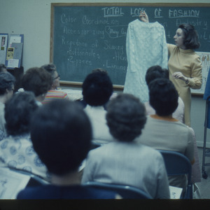 Woman presenting on fashion, circa May 1969