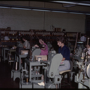 Women working on sewing machines, circa May 1963