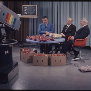 News anchors with apples, October 9, 1968