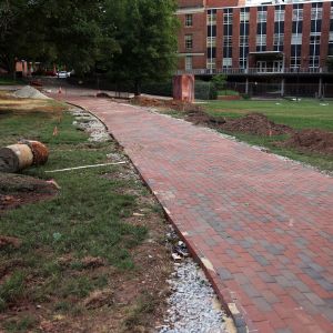 Construction of brick pathway near D. H. Hill