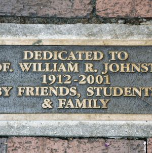 Plaque to statue of "The Strolling Professor," William R. Johnston