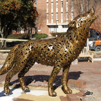 Installation of Wolf statues in front of Free Expression Tunnel