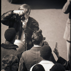 Protesters, including organizer Eric Moore, and photographer at Eddie Davis protest, 1969