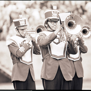 Marching band at sports game, circa 1969-1975
