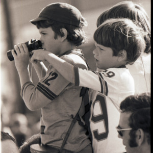 Children with binoculars, circa 1969-1975