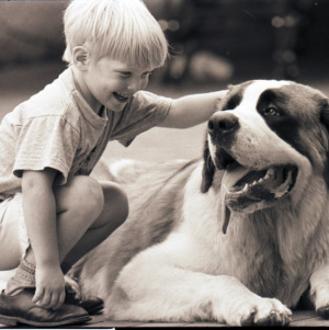 Child and dog, circa 1969-1975