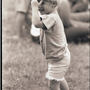 Child at event, circa 1969-1975