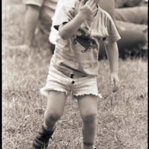 Child at event, circa 1969-1975