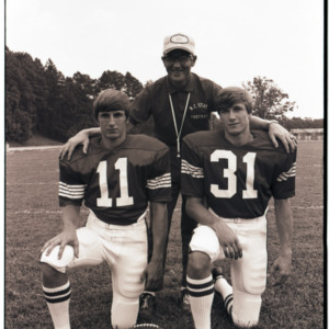 Coach Lou Holtz and football players portrait, 1972-1975