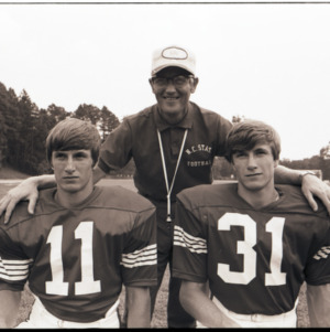 Coach Lou Holtz and football players portrait, 1972-1975
