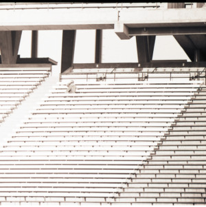 Spectator in stands at freshman football game: NC State versus Duke, circa 1969-1975