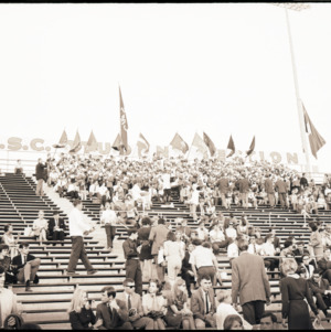 USC marching band and spectators in student section, 1969