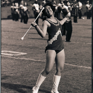 Majorette on field, circa 1969-1975
