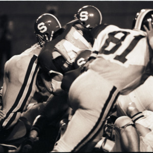 Football players at NC State versus East Carolina game, 1973