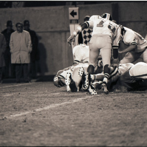 Football players at NC State versus East Carolina game, circa 1969-1975