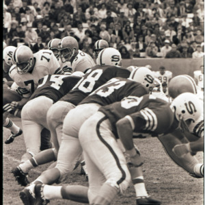 Football players at NC State versus Florida State game, circa 1969-1975