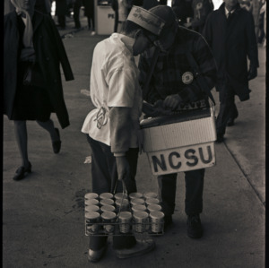 Concessions staff and spectators at NC State versus Houston football game, circa 1969-1975