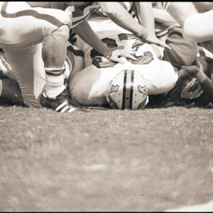 Football players at NC State versus Maryland game, circa 1969-1975