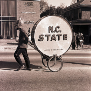 Marching band mascot in parade, 1969