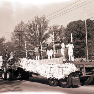 People on float in parade, 1969