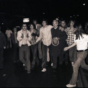 John Caldwell and celebrators after basketball victory over UCLA, March 23, 1974