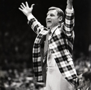 Coach Norm Sloan on sideline of basketball game, 1974